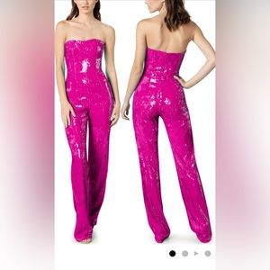 bright pink jumpsuit, new with tags all s